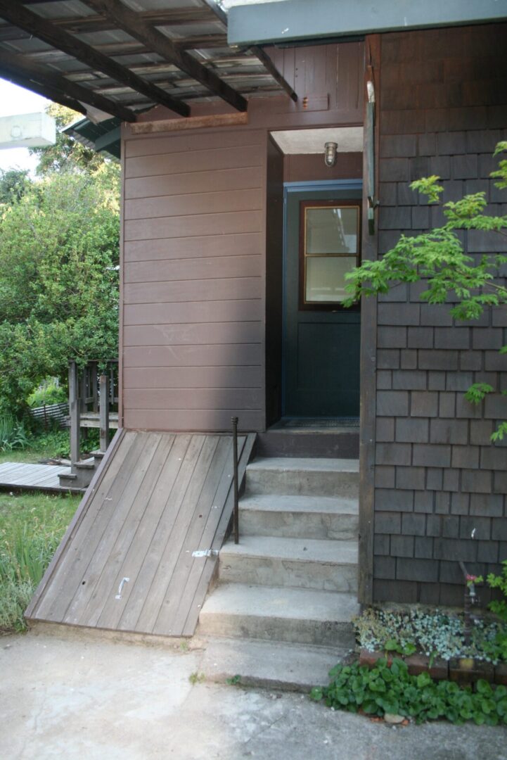 A ramp leading to the front door of a house.